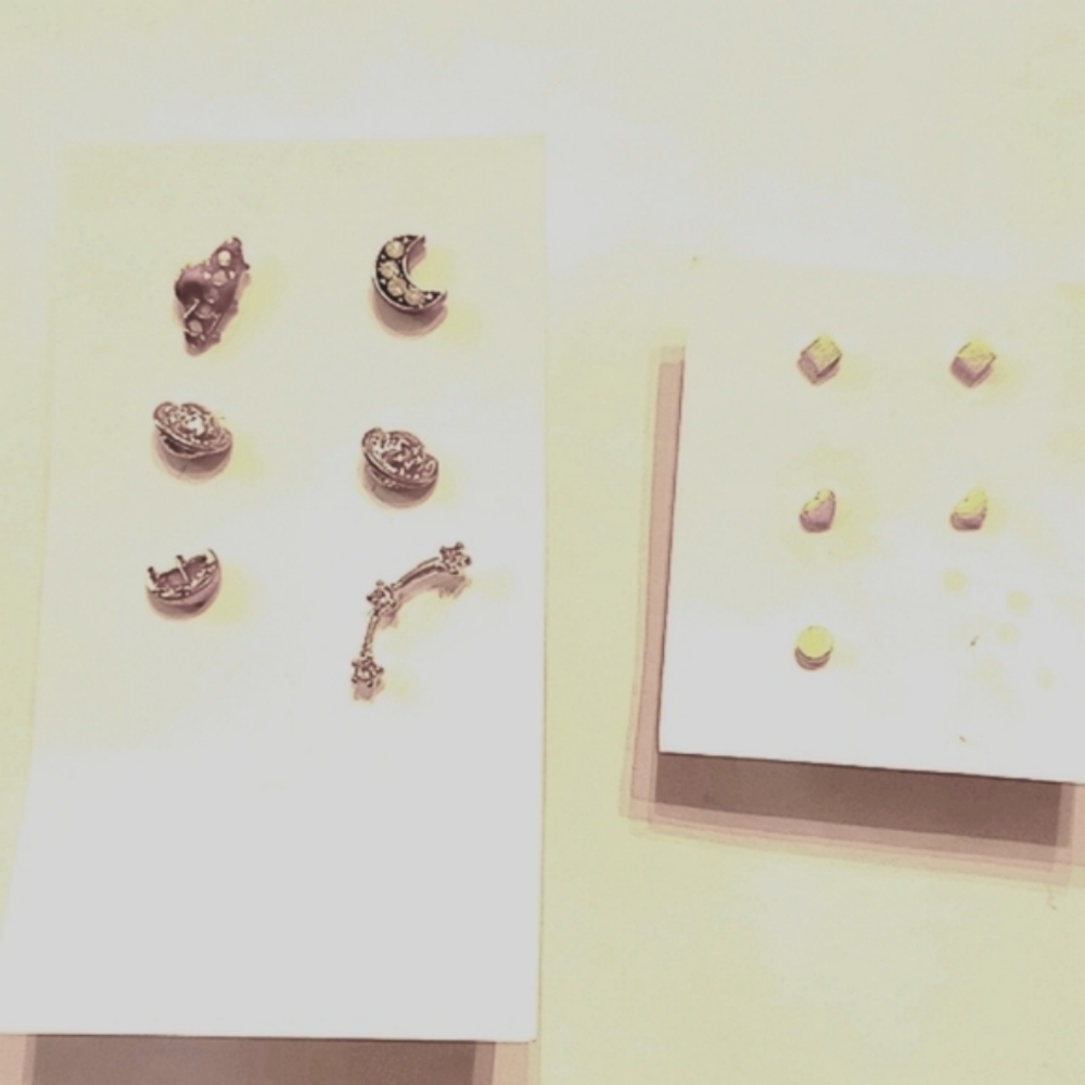 Studs pairs and mismatched. Same theme. Infant studs piercings. Vintage